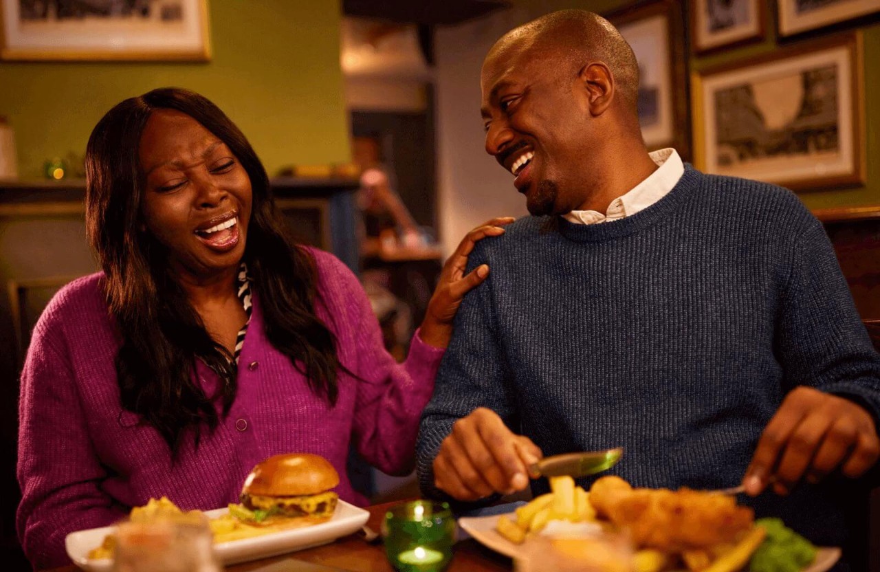 Two people having a meal at a restaurant