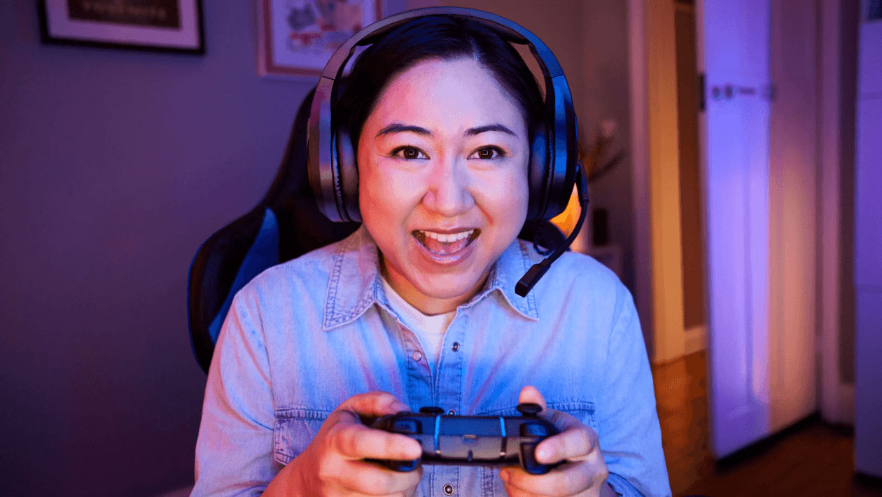 Image of a person holding a gaming controller